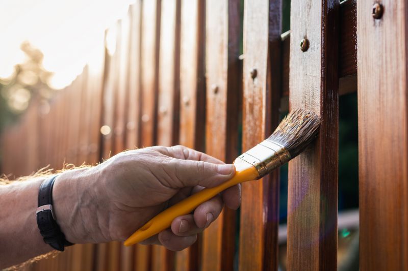 Local Fence Painting Or Staining pros at work